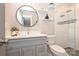 Modern bathroom with a glass-enclosed shower, sleek vanity, and elegant fixtures at 532 Scaleybark Rd, Charlotte, NC 28209