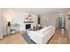 Cozy living room showcasing a decorative fireplace, shiplap accent wall, and contemporary furnishings at 532 Scaleybark Rd, Charlotte, NC 28209