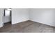 Bedroom featuring modern flooring, neutral paint, and a view to the outside at 5343 Esther Ln, Charlotte, NC 28214