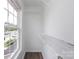 Well-lit closet with ample shelving and a window for natural light at 5343 Esther Ln, Charlotte, NC 28214
