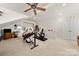 Bright bonus room featuring exercise equipment, a TV, and ample space for various activities at 5428 Colonial Garden Dr, Huntersville, NC 28078