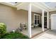Inviting covered front porch with seating, perfect for enjoying quiet moments outdoors at 5428 Colonial Garden Dr, Huntersville, NC 28078