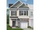 Charming two-story home featuring stone accents and a welcoming front entrance at 6009 Jasmine Branch Rd, Charlotte, NC 28216
