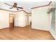 Inviting bedroom with hardwood floors and multiple closets, illuminated by natural light at 611 W Robinson St, Dallas, NC 28034