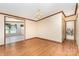 An elegant dining area features hardwood floors, chandelier lighting, and easy access to the kitchen at 611 W Robinson St, Dallas, NC 28034