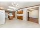 Spacious open-concept kitchen with oak cabinets, white appliances, and adjacent dining area at 611 W Robinson St, Dallas, NC 28034