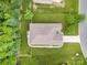 Overhead view of a home with a well-manicured lawn and garden, plus a private, fenced backyard at 8737 Mullis Forest Ct, Mint Hill, NC 28227