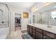 Bathroom with double vanity, glass shower, walk in closet and a separate toilet room at 8737 Mullis Forest Ct, Mint Hill, NC 28227