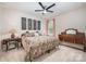 Cozy bedroom featuring warm lighting, vintage furniture and floral décor at 8737 Mullis Forest Ct, Mint Hill, NC 28227