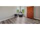 Cozy bedroom featuring hardwood floors, dark furniture and natural light at 9008 Magna Ln, Indian Trail, NC 28079