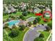 Aerial view of community amenities: pool, tennis courts, and clubhouse, with property highlighted at 9008 Magna Ln, Indian Trail, NC 28079