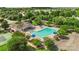 Aerial view of the community pool, tennis courts, and clubhouse with ample parking at 9008 Magna Ln, Indian Trail, NC 28079