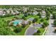 Community featuring a pool, tennis courts, and a clubhouse surrounded by mature trees at 9008 Magna Ln, Indian Trail, NC 28079