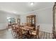 Well-lit dining room featuring a large table and elegant furnishings at 9008 Magna Ln, Indian Trail, NC 28079