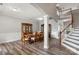 Elegant dining room with beautiful wood floors and ample seating at 9008 Magna Ln, Indian Trail, NC 28079