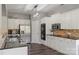 Modern kitchen featuring white cabinets, stainless steel appliances, and dark countertops at 9008 Magna Ln, Indian Trail, NC 28079
