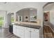 Kitchen view featuring white cabinets, dark countertops and an open design at 9008 Magna Ln, Indian Trail, NC 28079
