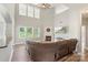 Bright living room with fireplace, large windows, and open layout at 9008 Magna Ln, Indian Trail, NC 28079