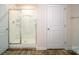 Walk-in shower featuring glass doors and built-in shelving for all your bathing needs in an inviting space at 921 Two Brothers Ln, York, SC 29745