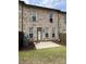 Backyard features a grassy lawn and a concrete patio for outdoor enjoyment at 9593 Camberley Nw Ave, Concord, NC 28027