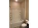 Cozy bathroom features a shower and tub combination and a commode at 9593 Camberley Nw Ave, Concord, NC 28027