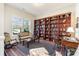 Elegant living room with a large bookcase, decorative furnishings and classic-style decor at 10016 St Kitts Landing Ln, Charlotte, NC 28278