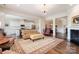 Open concept living room flowing seamlessly into the kitchen, offering modern living space at 10016 St Kitts Landing Ln, Charlotte, NC 28278
