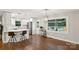 Open concept kitchen with a breakfast bar and backyard views to an outdoor entertaining space at 1021 Nancy Dr, Charlotte, NC 28211