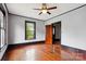 Bedroom featuring hardwood floors, black trim and a ceiling fan at 107 Hinton St, Chester, SC 29706