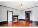 Bright bedroom with hardwood floors and fireplace at 107 Hinton St, Chester, SC 29706