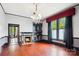 Elegant living room featuring an ornate fireplace, hardwood floors, and a decorative chandelier at 107 Hinton St, Chester, SC 29706