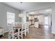 Inviting dining area with a stylish chandelier open to the kitchen at 1077 River Haven Sw Ave, Concord, NC 28025