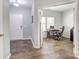 Inviting entryway showcasing wood flooring and open access to a bright office space at 1077 River Haven Sw Ave, Concord, NC 28025