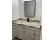 Bright bathroom featuring a granite countertop, sleek fixtures, and modern black framed mirror at 111 Billy Joe Rd, Mooresville, NC 28117