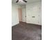 Bedroom featuring carpet, ceiling fan, and a hallway off to another space at 111 Billy Joe Rd, Mooresville, NC 28117