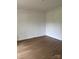 Empty room features hardwood floors and neutral paint at 111 Billy Joe Rd, Mooresville, NC 28117