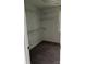 Walk-in closet with carpet, shelving, and a window at 111 Billy Joe Rd, Mooresville, NC 28117