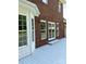 View of house from the gray painted deck with white trim and manicured lawn at 111 Billy Joe Rd, Mooresville, NC 28117