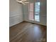 Dining room with beautiful trim, modern lighting and a large window at 111 Billy Joe Rd, Mooresville, NC 28117