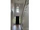 Two-story foyer features staircase, hardwood floors and modern lighting at 111 Billy Joe Rd, Mooresville, NC 28117