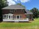 Spacious two-story brick home with a large deck, perfect for outdoor entertaining at 111 Billy Joe Rd, Mooresville, NC 28117