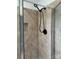 Walk-in shower featuring sleek hardware and textured walls, providing a modern bathroom at 111 Billy Joe Rd, Mooresville, NC 28117