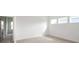 New bedroom with three windows, neutral walls and carpet at 1190 Sugar Creek Rd, Fort Mill, SC 29707