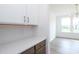 Bright kitchen with white cabinets, quartz countertops, and stainless steel appliances at 1190 Sugar Creek Rd, Fort Mill, SC 29707