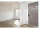 Bright entryway with hardwood floors, modern lighting, and an inviting atmosphere at 1190 Sugar Creek Rd, Fort Mill, SC 29707