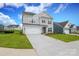 Beautiful two-story home with a spacious driveway and lush green lawn at 1190 Sugar Creek Rd, Fort Mill, SC 29707