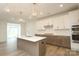 Bright kitchen with stainless appliances, island, and pendant lighting and gas cooktop at 1190 Sugar Creek Rd, Fort Mill, SC 29707