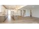 Bright kitchen with stainless appliances, island, and pendant lighting open to the living area at 1190 Sugar Creek Rd, Fort Mill, SC 29707