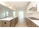 Bright kitchen with stainless appliances, island with dishwasher, and gas cooktop at 1190 Sugar Creek Rd, Fort Mill, SC 29707