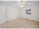 Bedroom with ceiling fan and tile flooring at 1261 Westbrook Cir, Gastonia, NC 28052